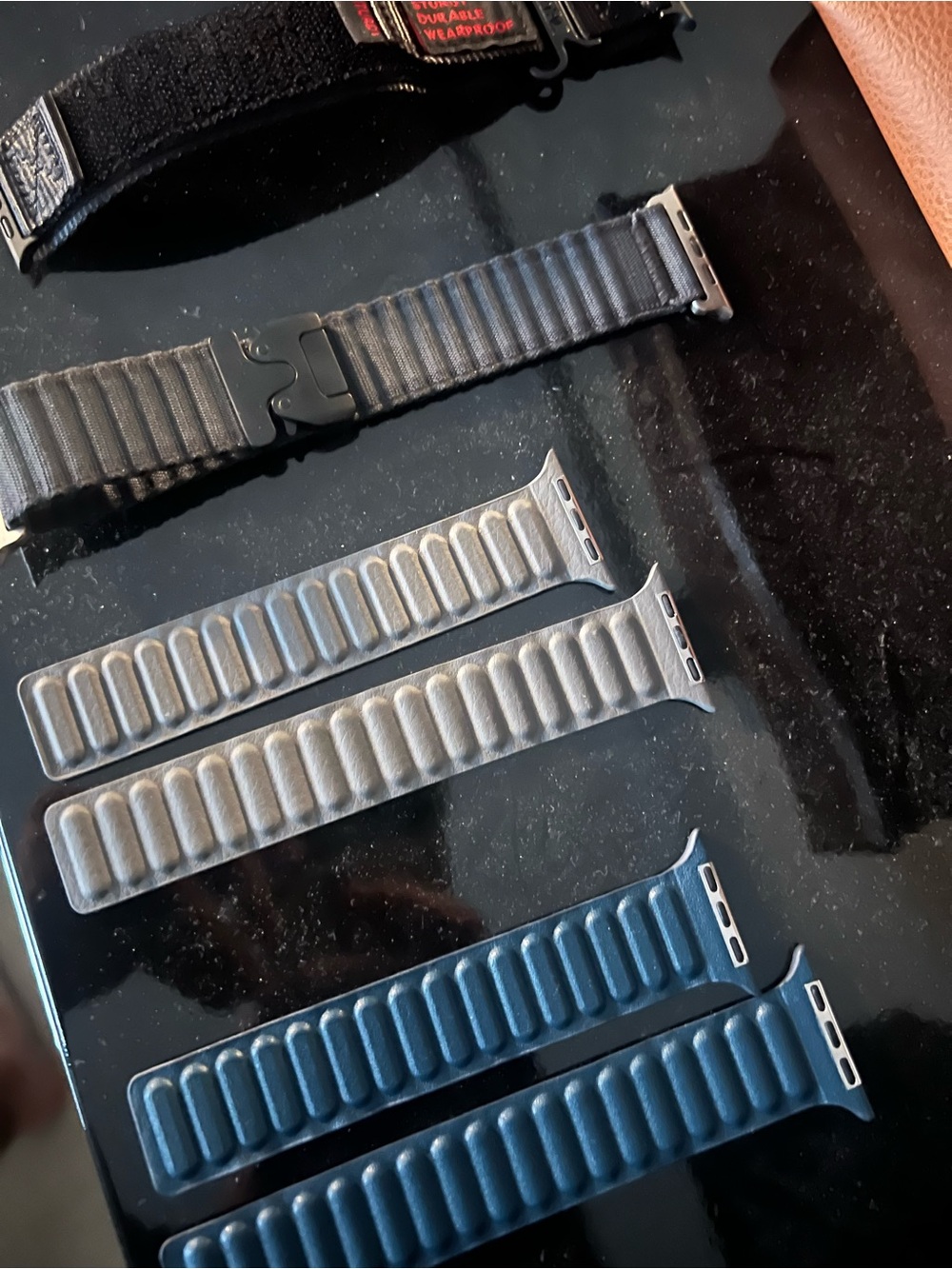 Apple Leather Link Watch Bands in Black, Gray, and Blue